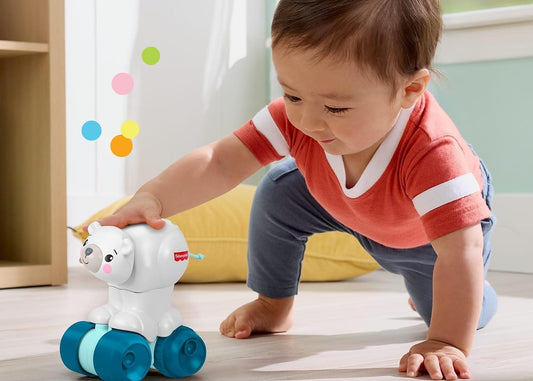 FISHER-PRICE sensoryczny jeżdżący miś polarny do nauki raczkowania 9 m+