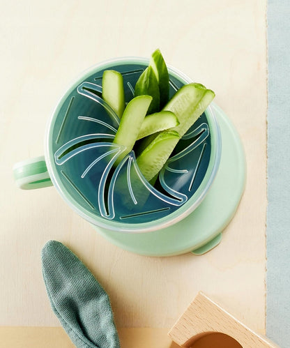 Widok z góry pojemnika Nip Eat Green Snackbox z przekąskami.
