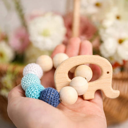 MAMIMAMI elephantteethercomes in a pouch with drawstringsage 6 m+colour beigematerials maple wood, cottonfree