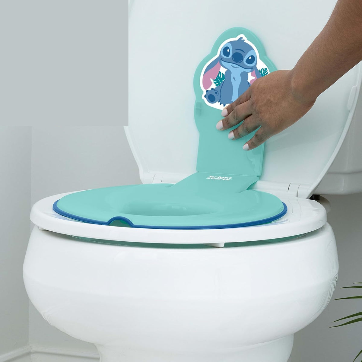 Bright Starts Flip Sit réducteur de toilette Stitch 18m+