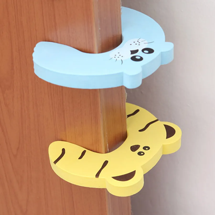 Protection contre le pincement des doigts par la porte VACHE